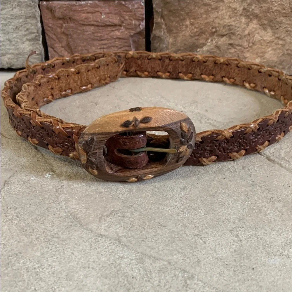 Leather tooled size small belt with wooden buckle